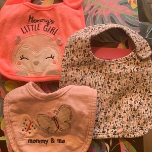 3 pack of baby girl one sizes by Carter’s bibs